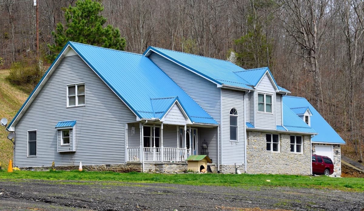 Home with blue metal roof